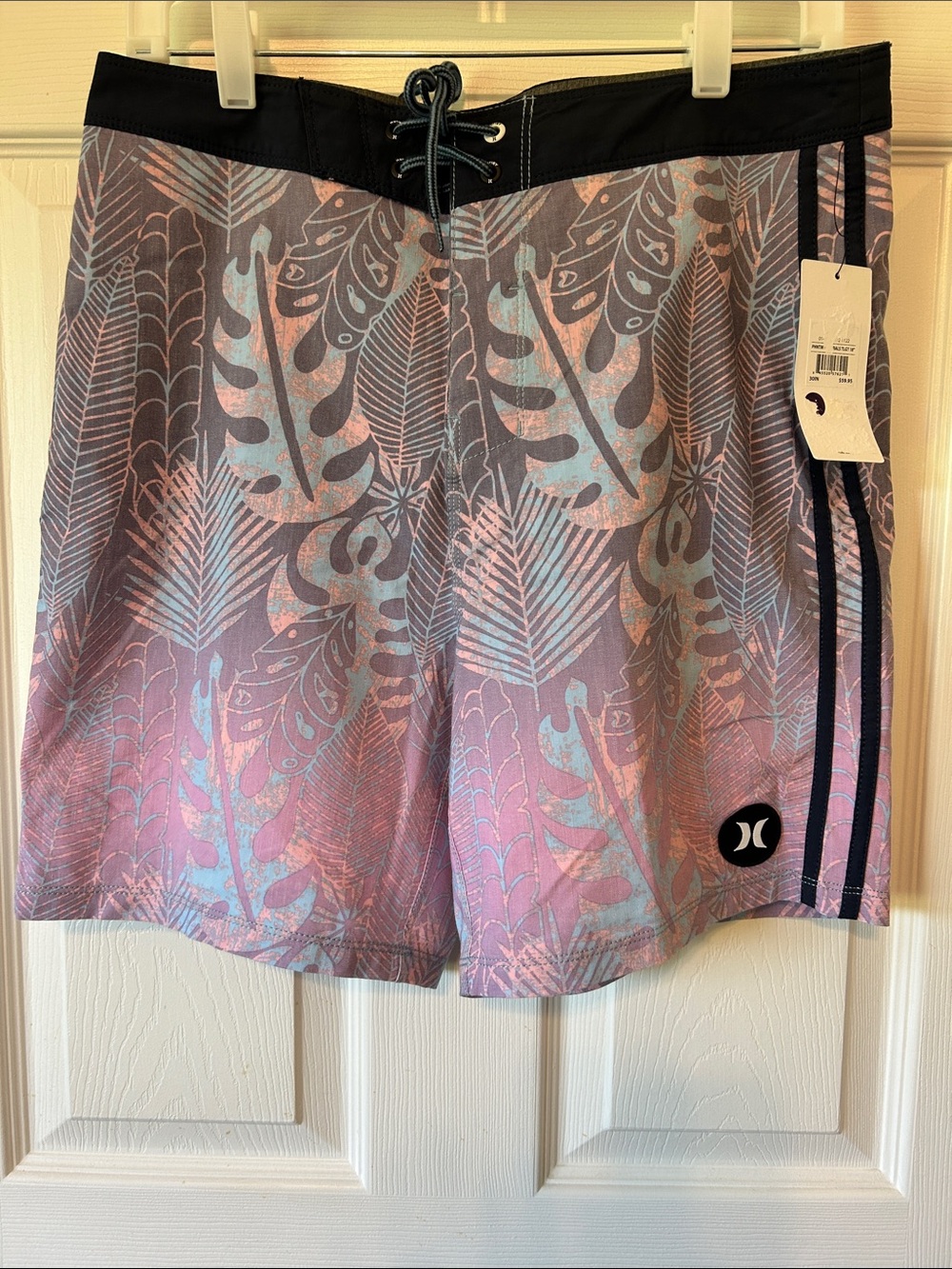Hurley Pink and Light Blue Tropical Leaf Swim Shorts or cover ups.